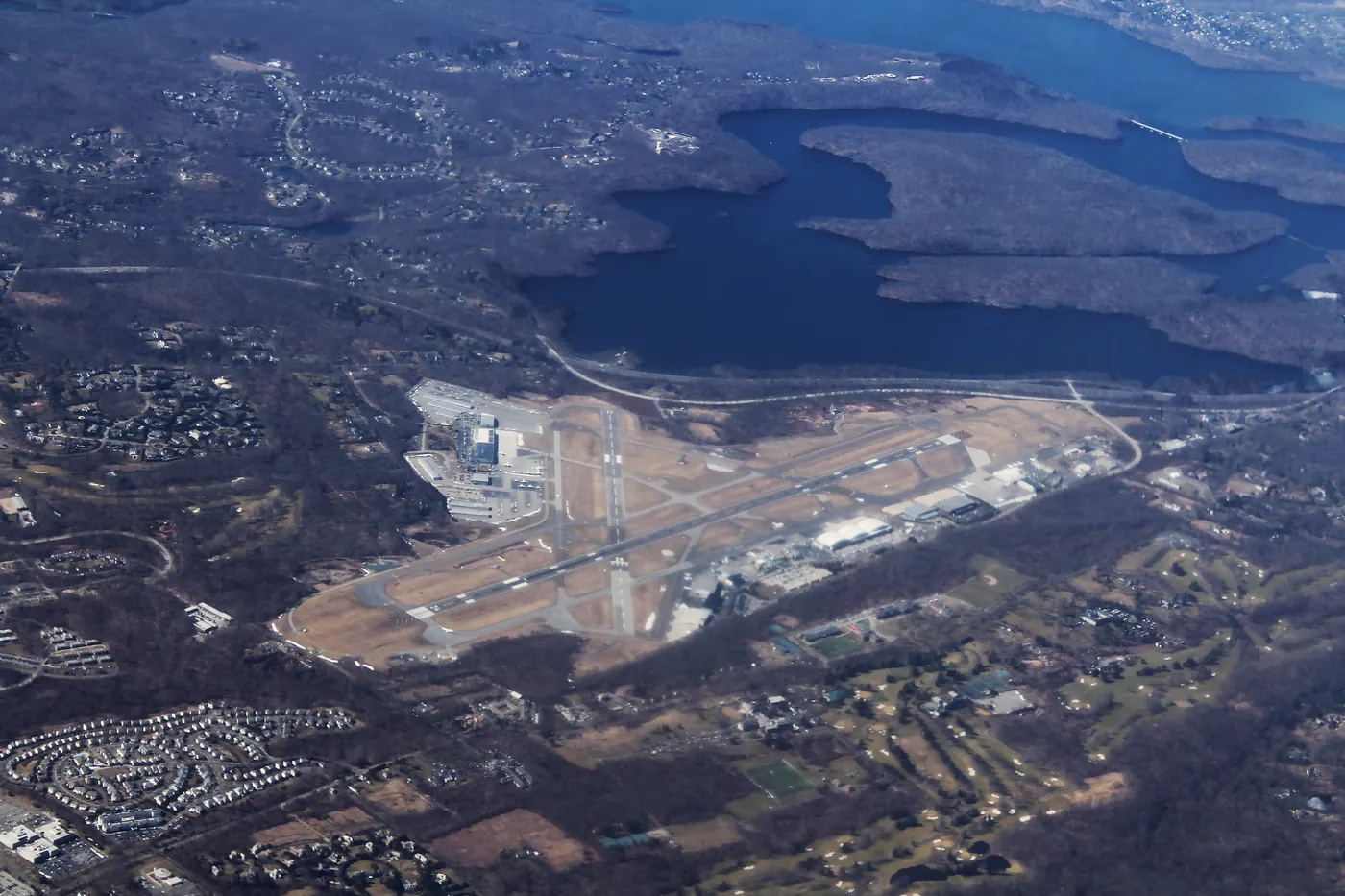 Aerial view of Westchester County Airport and nearby reservoirs, photographed in March 2013