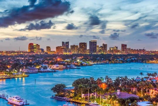 Fort Lauderdale skyline across the water at dusk