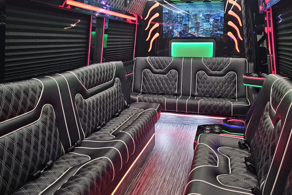 Limo Sprinter cabin with lounge seating and illuminated ceiling